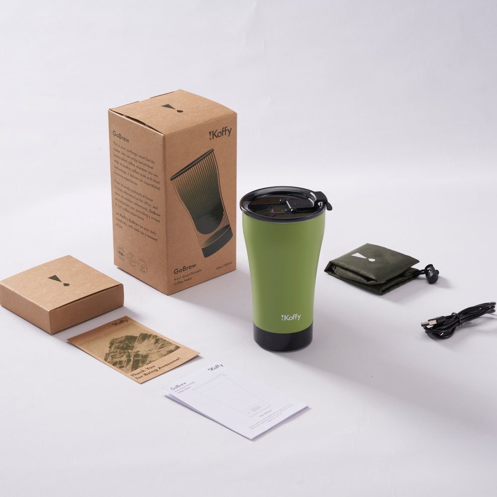 GoBrew coffee maker packaging contents, including cup, USB cable, user manual, thank you card, and portable storage bag.