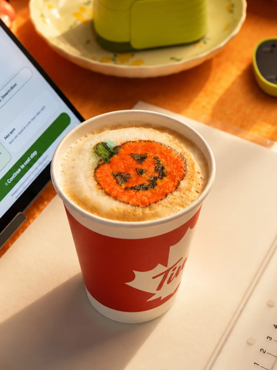 A jack-o-lantern printed on cappuccino foam.